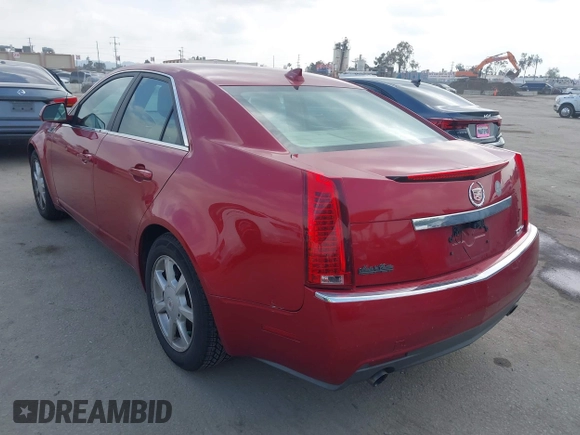 2009 Cadillac CTS AWD w/1SA with VIN 1G6DG577990113572, listed as a IAAI auction lot 42110784 with 229,692 mi miles. Bid and sale history available at carsss.com. Image 3.