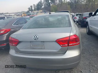 2012 Volkswagen Passat SE z VIN 1VWBH7A3XCC108676, wystawiony jako IAAI lot #41897380 z przebiegiem 94 066 mil mil oraz . Historia ofert i sprzedaży dostępna na DreamBid. Obrazek 16.