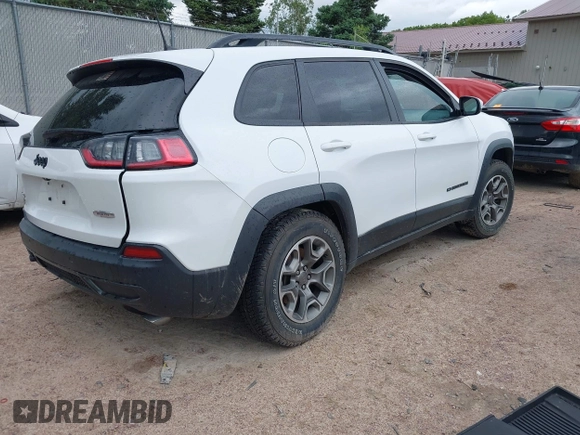 2020 Jeep Cherokee Latitude with VIN 1C4PJMCXXLD578180, listed as a IAAI auction lot 42438023 with 82,845 mi miles and . Bid and sale history available at DreamBid. Image 4.