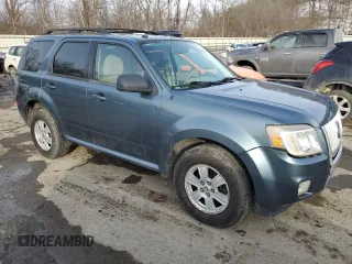 2010 Mercury Mariner with VIN 4M2CN9BG5AKJ14167, listed as a Copart auction lot 43030745 with 202,185 mi miles and Clean title. Bid and sale history available at DreamBid. Image 4.