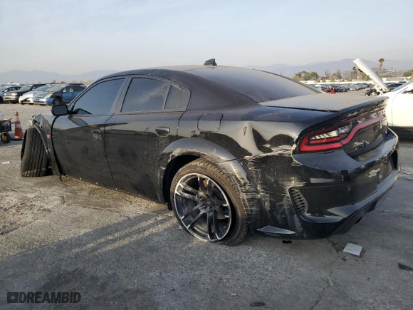 2022 Dodge Charger Scat Pack Widebody with VIN 2C3CDXGJ8NH130544, listed as a Copart auction lot 43410165 with 28,786 mi miles and Salvage Title. Bid and sale history available at carsss.com. Image 2.