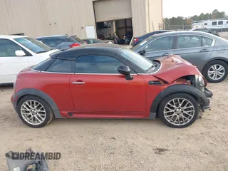 2015 MINI Coupe z VIN WMWSX1C54FT508123, wystawiony jako IAAI lot #40974103 z przebiegiem 79 035 mil mil oraz . Historia ofert i sprzedaży dostępna na DreamBid. Obrazek 13.