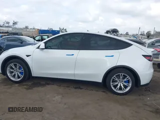 2024 Tesla Model Y Long Range with VIN 7SAYGDEE5RF036018, listed as a IAAI auction lot 42120803 with 25,347 mi miles. Bid and sale history available at carsss.com. Image 14.
