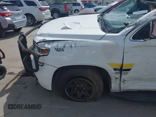 2016 Chevrolet Tahoe Commercial z VIN 1GNLCDEC9GR299693, wystawiony jako IAAI lot #42630221 z przebiegiem 127 081 mil mil oraz . Historia ofert i sprzedaży dostępna na DreamBid. Obrazek 18.