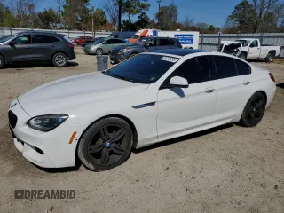 2015 BMW 6 Series 650i xDrive with VIN WBA6B4C57FD761268, listed as a Copart auction lot 49779055 with 106,118 mi miles and Salvage Title. Bid and sale history available at carsss.com. Image 1.