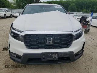 2023 Honda Passport EX-L z VIN 5FNYF8H51PB033343, wystawiony jako Copart lot #56594665 z przebiegiem 18 554 mil mil oraz Szkoda całkowita • Salvage title. Historia ofert i sprzedaży dostępna na DreamBid. Obrazek 5.