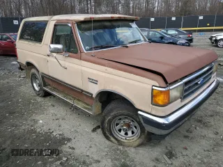 1990 Ford Bronco XL with VIN 1FMEU15N0LLB03440, listed as a Copart auction lot 44936595 with 197,758 mi miles and Clean Title. Bid and sale history available at carsss.com. Image 4.