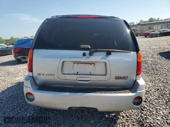 2009 GMC Envoy SLE z VIN 1GKDS33S292130250, wystawiony jako Copart lot #53634415 z przebiegiem Nie podano mil oraz Szkoda całkowita • Salvage title. Historia ofert i sprzedaży dostępna na DreamBid. Obrazek 6.