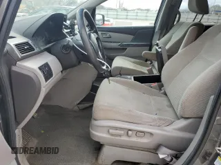 2013 Honda Odyssey EX z VIN 5FNRL5H40DB033400, wystawiony jako Copart lot #50552155 z przebiegiem 223 770 mil mil oraz Nie do naprawy. Historia ofert i sprzedaży dostępna na DreamBid. Obrazek 7.