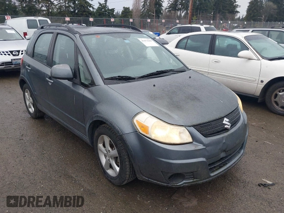 2008 Suzuki SX4 Regional Edition Touring with VIN JS2YA413285102839, listed as a IAAI auction lot 41473669 with 102,914 mi miles. Bid and sale history available at carsss.com. Image 1.