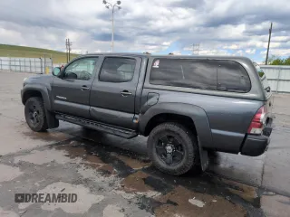 2009 Toyota Tacoma with VIN 3TMLU42N39M024000, listed as a Copart auction lot 55301375 with 210,068 mi miles and Salvage Title. Bid and sale history available at DreamBid. Image 2.