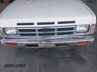1990 Nissan Frontier z VIN 1N6SD11S2LC427683, wystawiony jako IAAI lot #42359094 z przebiegiem 172 624 mil mil oraz . Historia ofert i sprzedaży dostępna na DreamBid. Obrazek 6.