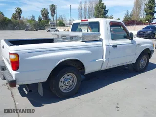 2003 Mazda B-Series 2WD Truck SX with VIN 4F4YR12D53TM11564, listed as a IAAI auction lot 42028399 with 218,402 mi miles. Bid and sale history available at carsss.com. Image 4.