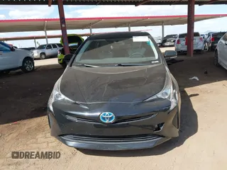 2016 Toyota Prius Two with VIN JTDKBRFUXG3503142, listed as a IAAI auction lot 42027700 with 185,319 mi miles. Bid and sale history available at carsss.com. Image 13.