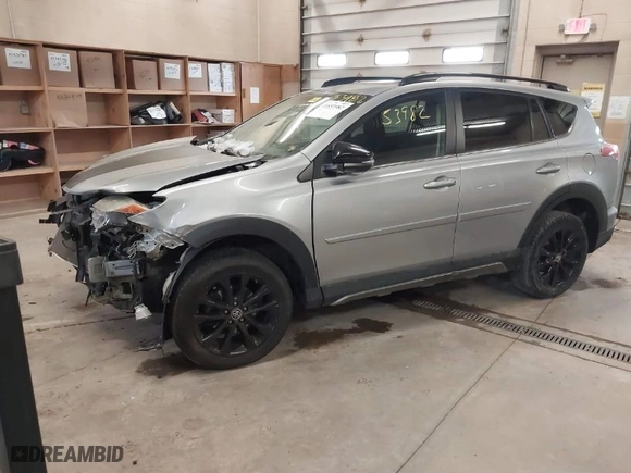 2018 Toyota RAV4 XLE with VIN 2T3RFREV4JW765403, listed as a IAAI auction lot 41853982 with 113,531 mi miles. Bid and sale history available at carsss.com. Image 2.
