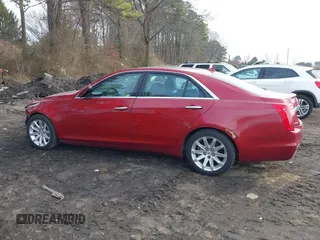 2014 Cadillac CTS Luxury AWD with VIN 1G6AX5S38E0146872, listed as a IAAI auction lot 41663642 with 56,787 mi miles and . Bid and sale history available at DreamBid. Image 14.