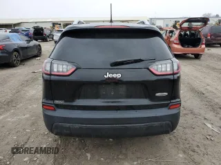 2020 Jeep Cherokee Latitude with VIN 1C4PJLCB7LD581651, listed as a Copart auction lot 42816555 with 100,845 mi miles and Salvage Title. Bid and sale history available at DreamBid. Image 6.