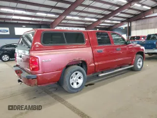 2008 Dodge Dakota SLT z VIN 1D7HW48K68S619433, wystawiony jako Copart lot #57327015 z przebiegiem 96 804 mil mil oraz Czysty tytuł • Clean title. Historia ofert i sprzedaży dostępna na DreamBid. Obrazek 3.