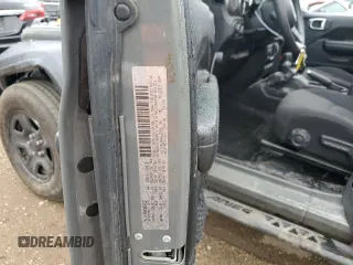 2020 Jeep Wrangler Willys with VIN 1C4GJXAN4LW225781, listed as a Copart auction lot 67316964 with 48,306 mi miles and Salvage title. Bid and sale history available at DreamBid. Image 12.