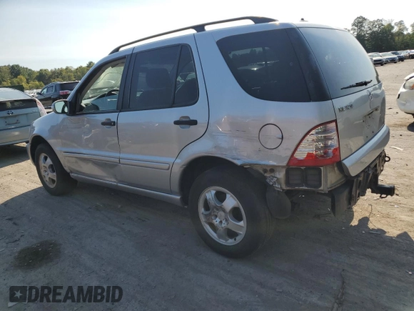 2002 Mercedes-Benz M-Class with VIN 4JGAB54E52A337189, listed as a Copart auction lot 71348154 with 220,378 mi miles and Salvage Title. Bid and sale history available at carsss.com. Image 2.