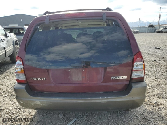 2004 Mazda Tribute LX with VIN 4F2YZ94184KM33916, listed as a Copart auction lot 70839734 with 0 mi miles and Salvage Title. Bid and sale history available at carsss.com. Image 6.