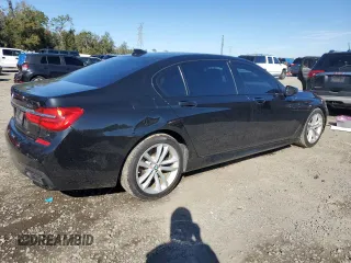 2016 BMW 7 Series 750i with VIN WBA7F0C5XGGL99549, listed as a Copart auction lot 41880015 with 54,181 mi miles and Salvage Title. Bid and sale history available at carsss.com. Image 3.