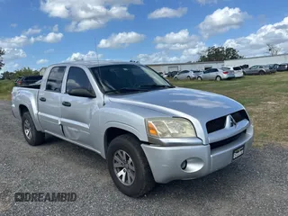 2008 Mitsubishi Raider LS z VIN 1Z7HC28K48S619975, wystawiony jako Copart lot #78905984 z przebiegiem 170 095 mil mil oraz Czysty tytuł • Clean title. Historia ofert i sprzedaży dostępna na DreamBid. Obrazek 1.