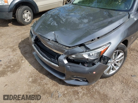 2015 Infiniti Q50 Premium z VIN JN1BV7AR1FM398047, wystawiony jako IAAI lot #42203862 z przebiegiem 104 002 mil mil oraz . Historia ofert i sprzedaży dostępna na DreamBid. Obrazek 6.