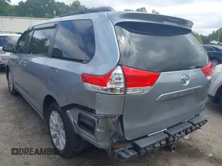 2013 Toyota Sienna LE with VIN 5TDJK3DC9DS054310, listed as a IAAI auction lot 42668103 with 209,712 mi miles and . Bid and sale history available at DreamBid. Image 3.