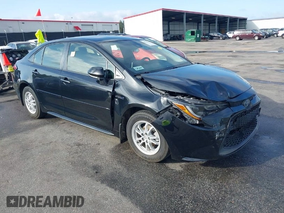 2021 Toyota Corolla Hybrid LE with VIN JTDEAMDE3MJ025426, listed as a IAAI auction lot 41922582 with 57,705 mi miles. Bid and sale history available at carsss.com. Image 1.