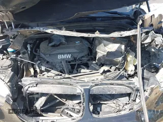 2017 BMW X1 sDrive28i z VIN WBXHU7C31H5H33748, wystawiony jako IAAI lot #42003198 z przebiegiem 71 274 mil mil oraz . Historia ofert i sprzedaży dostępna na DreamBid. Obrazek 10.