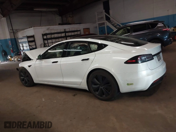2022 Tesla Model S z VIN 5YJSA1E59NF493914, wystawiony jako IAAI lot #41626020 z przebiegiem Nie podano mil oraz . Historia ofert i sprzedaży dostępna na DreamBid. Obrazek 14.