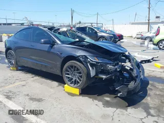 2024 Tesla Model 3 Long Range with VIN 5YJ3E1EBXRF816954, listed as a IAAI auction lot 41831076 with 6,052 mi miles and . Bid and sale history available at DreamBid. Image 1.