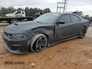 2019 Dodge Charger Scat Pack with VIN 2C3CDXGJ8KH638590, listed as a Copart auction lot 84241704 with 104,354 mi miles and Salvage Title. Bid and sale history available at DreamBid. Image 1.
