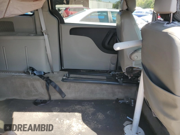 2013 Dodge Grand Caravan SXT with VIN 2C4RDGCG0DR639634, listed as a Copart auction lot 52548075 with 27,799 mi miles and Salvage Title. Bid and sale history available at DreamBid. Image 12.