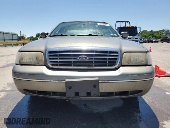 2003 Ford Crown Victoria LX z VIN 2FAFP74W43X123583, wystawiony jako Copart lot #57677555 z przebiegiem 185 336 mil mil oraz Szkoda całkowita • Salvage title. Historia ofert i sprzedaży dostępna na DreamBid. Obrazek 5.