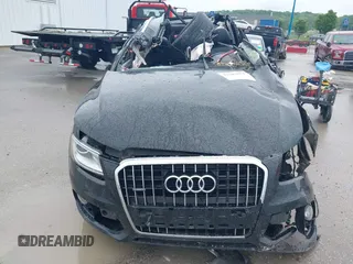 2015 Audi Q5 Premium Plus z VIN WA1LFAFP5FA006685, wystawiony jako IAAI lot #42182651 z przebiegiem Nie podano mil oraz . Historia ofert i sprzedaży dostępna na DreamBid. Obrazek 11.