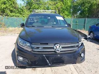 2014 Volkswagen Tiguan S z VIN WVGBV3AX5EW560393, wystawiony jako IAAI lot #42105203 z przebiegiem 102 001 mil mil oraz . Historia ofert i sprzedaży dostępna na DreamBid. Obrazek 13.