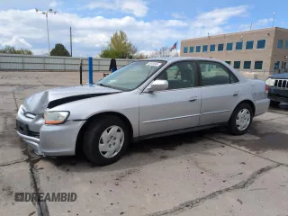 2001 Honda Accord LX with VIN 1HGCG16401A080034, listed as a Copart auction lot 55618245 with 93,716 mi miles and Salvage title. Bid and sale history available at DreamBid. Image 1.