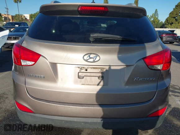 2013 Hyundai Tucson GLS with VIN KM8JU3AC0DU705782, listed as a IAAI auction lot 41804846 with 81,260 mi miles. Bid and sale history available at carsss.com. Image 16.