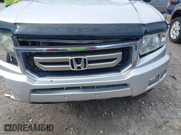 2009 Honda Ridgeline RTL with VIN 2HJYK16539H500986, listed as a IAAI auction lot 42084176 with 161,142 mi miles and . Bid and sale history available at DreamBid. Image 19.
