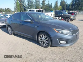 2015 Kia Optima EX with VIN 5XXGN4A77FG368704, listed as a IAAI auction lot 42174674 with 128,963 mi miles. Bid and sale history available at carsss.com. Image 1.