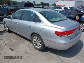 2007 Hyundai Azera SE z VIN KMHFC46F67A213796, wystawiony jako IAAI lot #42276751 z przebiegiem 139 200 mil mil oraz . Historia ofert i sprzedaży dostępna na DreamBid. Obrazek 3.