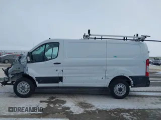2024 Ford Transit Cargo with VIN 1FTBR2Y80RKB39440, listed as a IAAI auction lot 41518278 with 1,111 mi miles and . Bid and sale history available at DreamBid. Image 14.