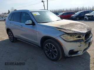 2018 BMW X5 xDrive35i with VIN 5UXKR0C51J0X92651, listed as a IAAI auction lot 41724974 with 83,496 mi miles. Bid and sale history available at carsss.com. Image 1.