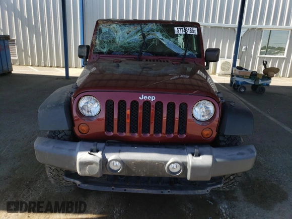 2010 Jeep Wrangler Unlimited Rubicon with VIN 1J4BA6H18AL197855, listed as a Copart auction lot 57748185 with 147,899 mi miles and Salvage title. Bid and sale history available at DreamBid. Image 5.