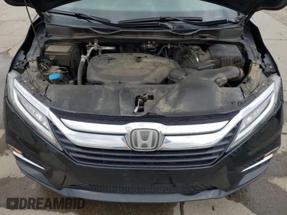 2018 Honda Odyssey Elite с VIN 5FNRL6H94JB007489, выставлен на аукционе Copart как лот 57077855 с пробегом 106 402 миль миль и Списание • Salvage title. История ставок и продаж доступна на DreamBid. Изображение 12.