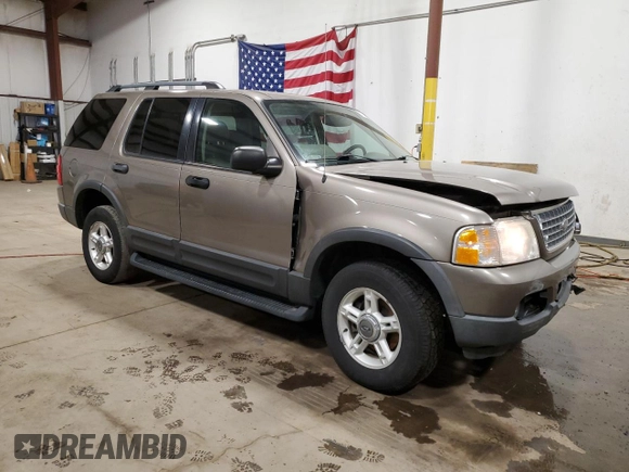 2003 Ford Explorer XLT with VIN 1FMZU73W03UA58560, listed as a Copart auction lot 87354824 with 157,052 mi miles and Salvage title. Bid and sale history available at DreamBid. Image 4.