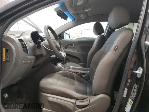 2012 Kia Sportage LX z VIN KNDPB3A24C7179584, wystawiony jako Copart lot #60938465 z przebiegiem 161 362 mil mil oraz Czysty tytuł • Clean title. Historia ofert i sprzedaży dostępna na DreamBid. Obrazek 7.