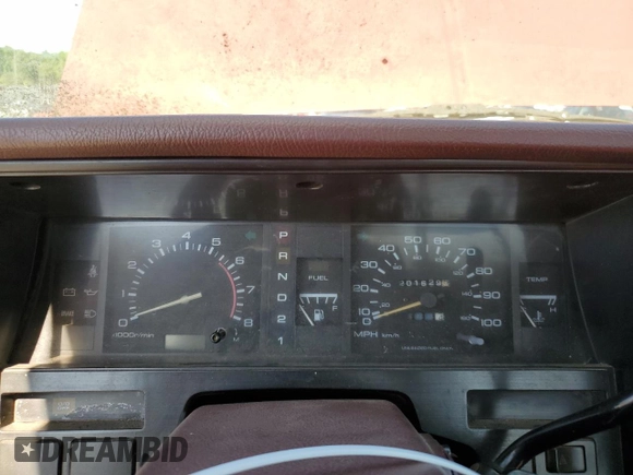 1991 Nissan Frontier XE with VIN 1N6SD11S2MC412375, listed as a Copart auction lot 61015515 with 201,629 mi miles and Salvage title. Bid and sale history available at DreamBid. Image 9.